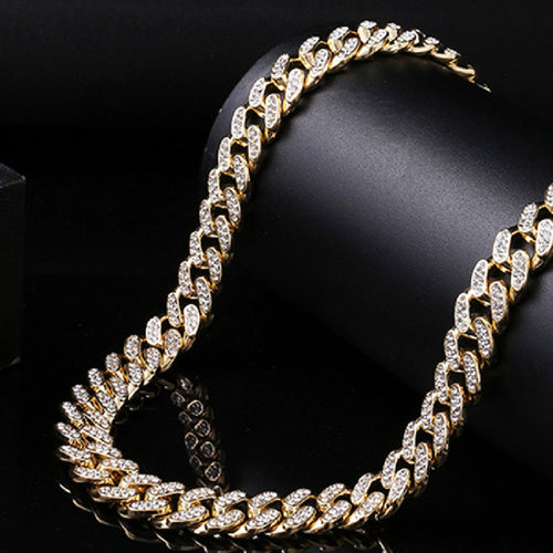 Cuban chain diamond bracelet showcasing a gold alloy design with inlaid diamonds, perfect for fashion enthusiasts.