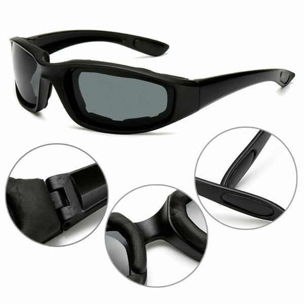 Motorcycle riding glasses wind resistant featured in black with protective padding and wraparound design.