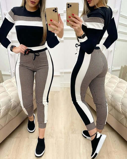 Women's short sleeve pant sets featuring a stylish black and white design with comfortable fit.