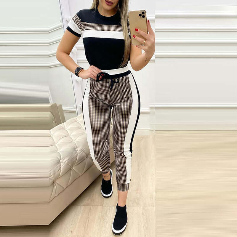 Women's short sleeve pant sets featuring a stylish black and white design with high waist pants.