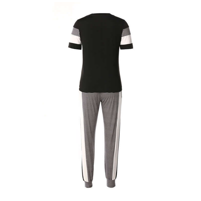 Back view of women's short sleeve pant sets featuring a black top with striped details and checkered high waist pants.
