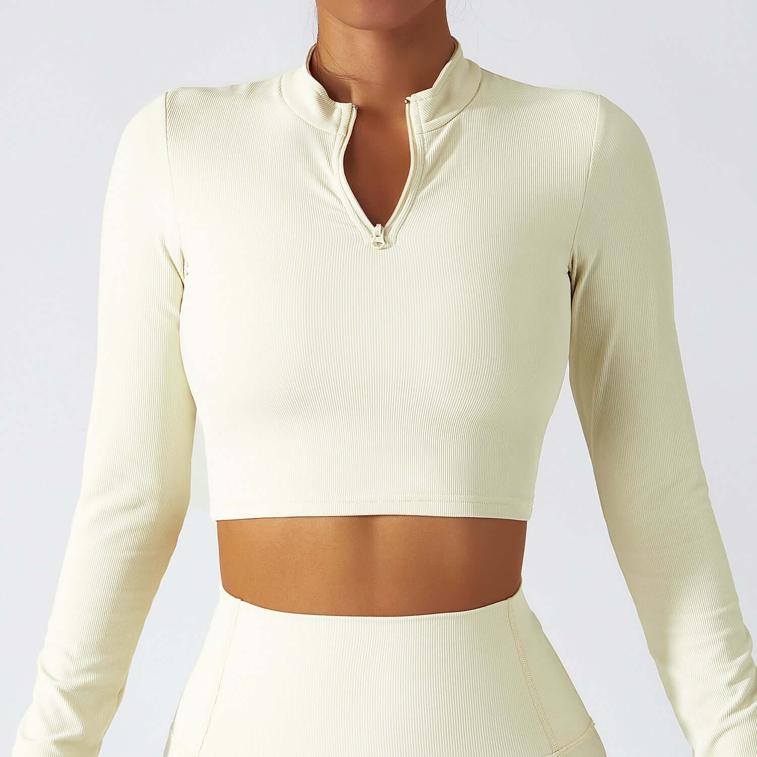 Stand collar zipper long sleeve quick dry yoga tops for women in a stylish beige shade.