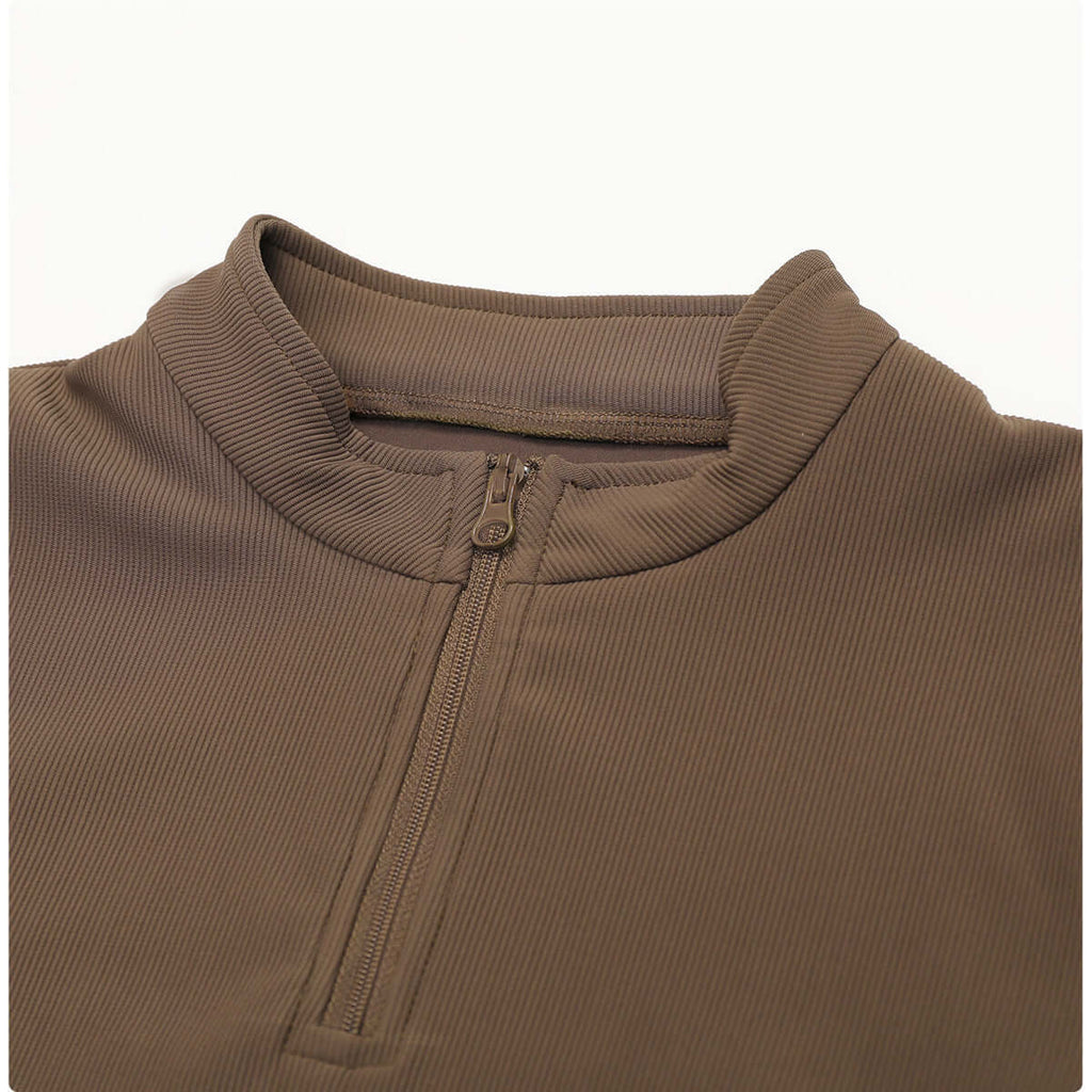 Stand collar zipper detail of quick dry yoga tops for women, designed for comfort and performance in yoga sessions.